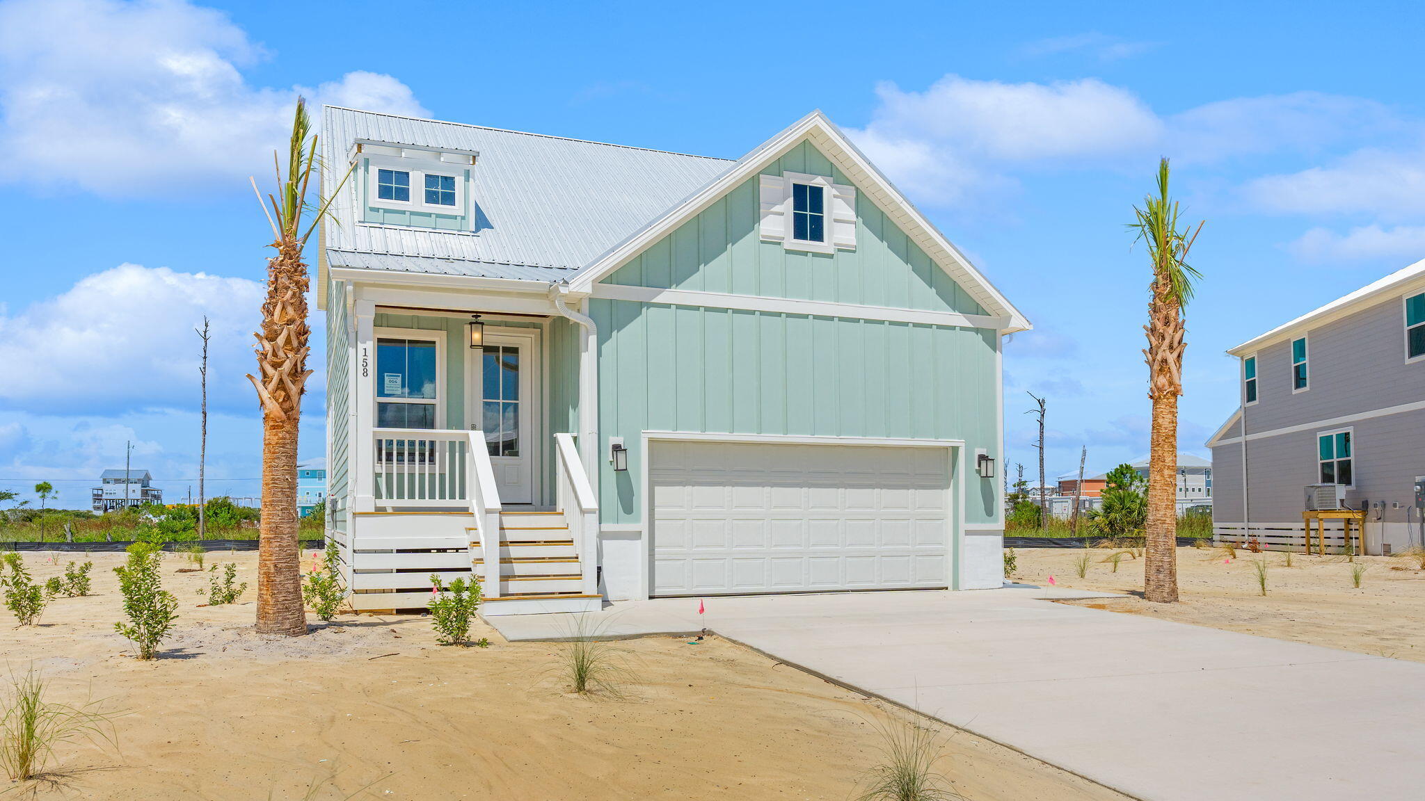 a front view of a house with a garage