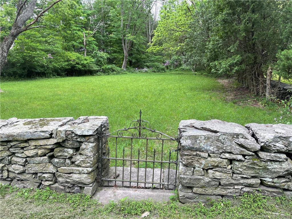 a view of a backyard with a garden