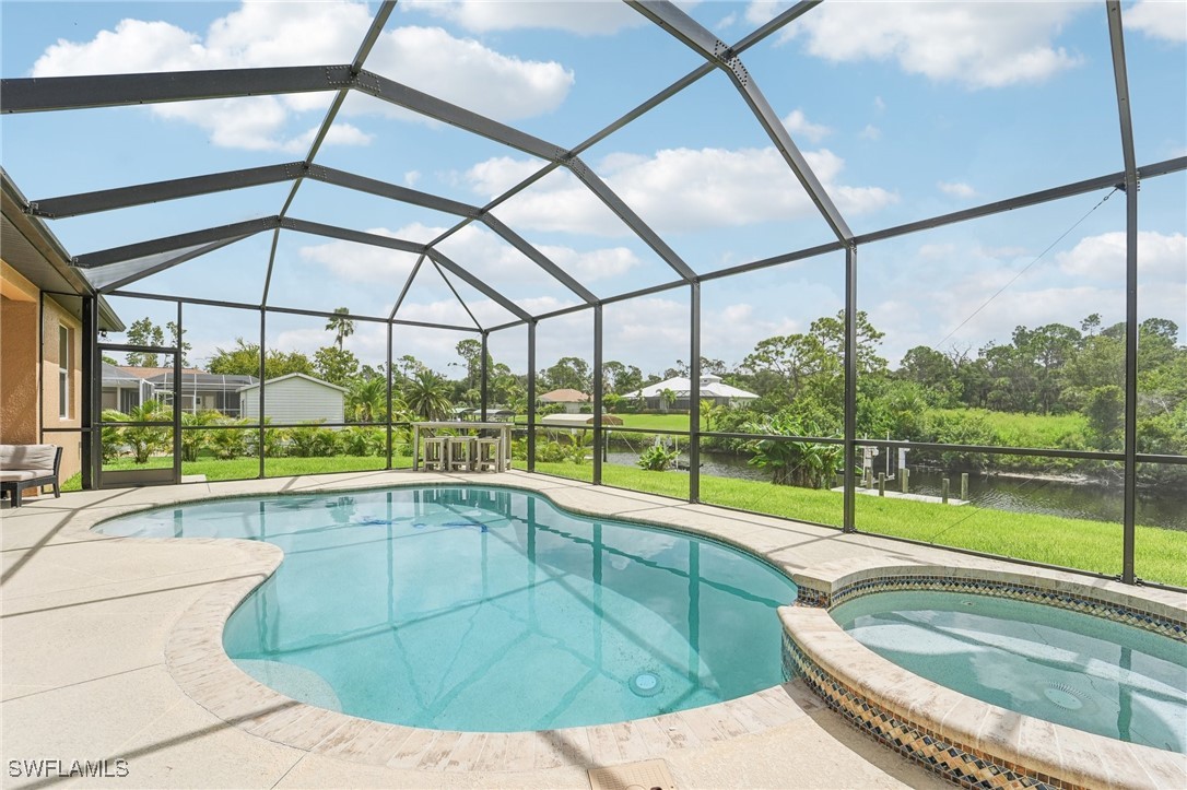 a view of a swimming pool with a porch