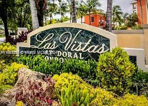 a view of a sign in a yard with potted plants