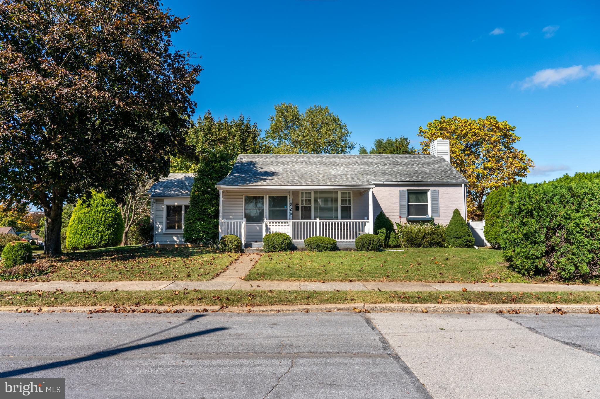 front view of a house with a patio