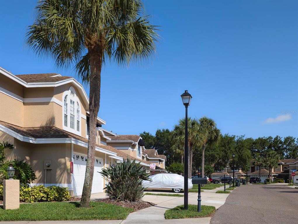 a view of a street with a building in the background