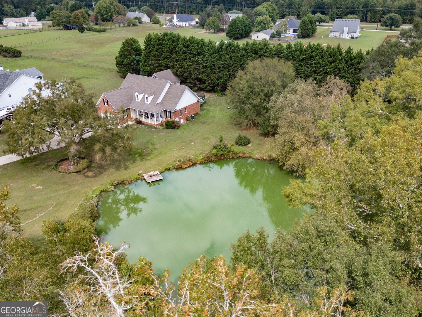 a view of a lake with a house