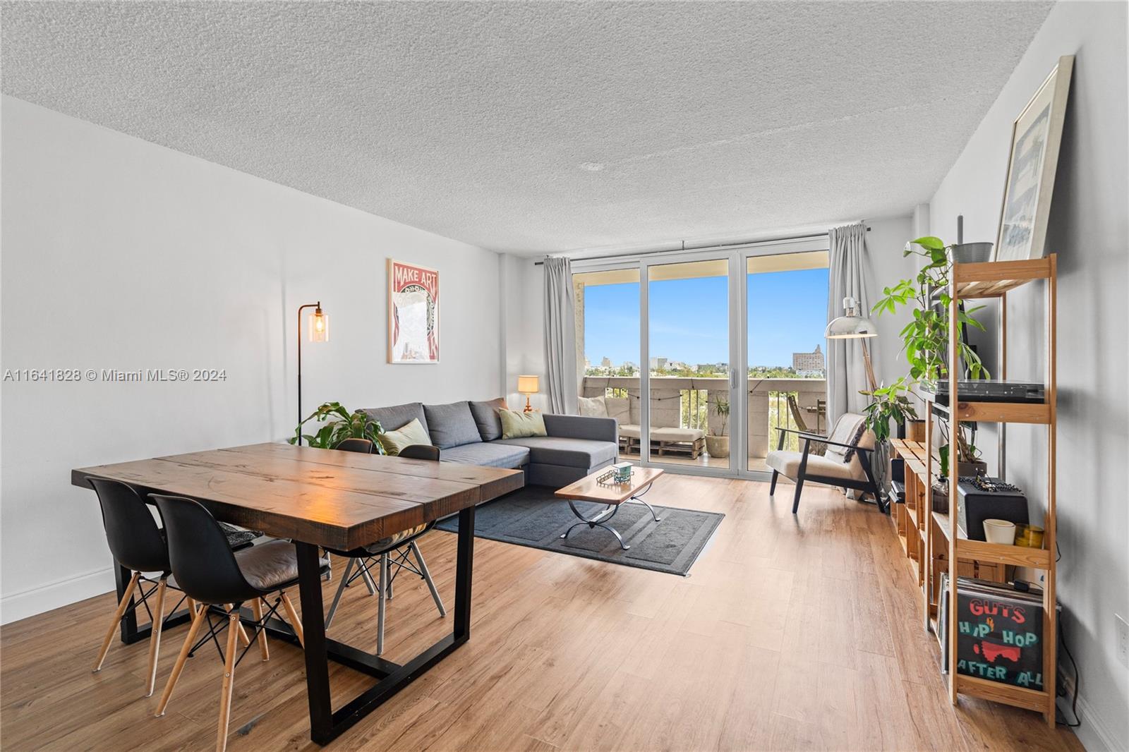 a view of a livingroom with furniture and a rug