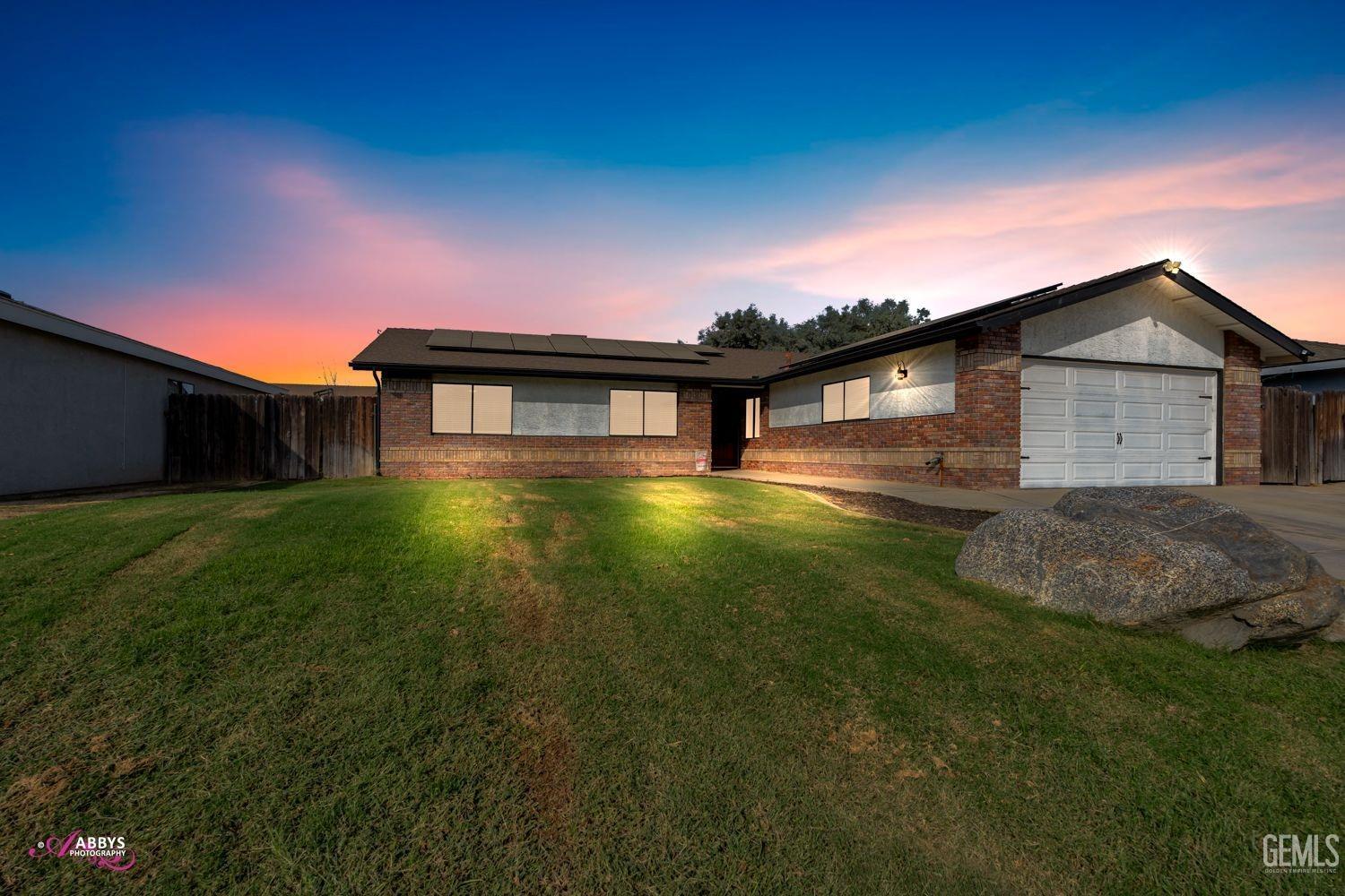 a view of a house with a big yard