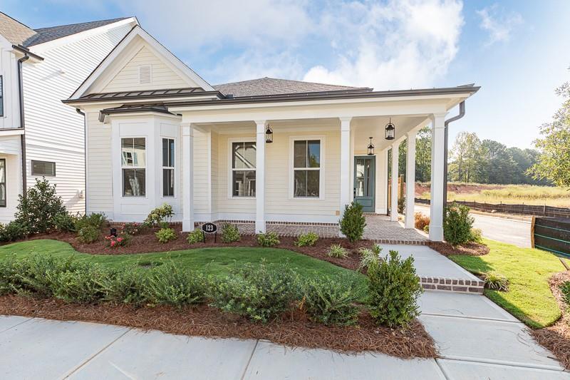 front view of a house with a small yard