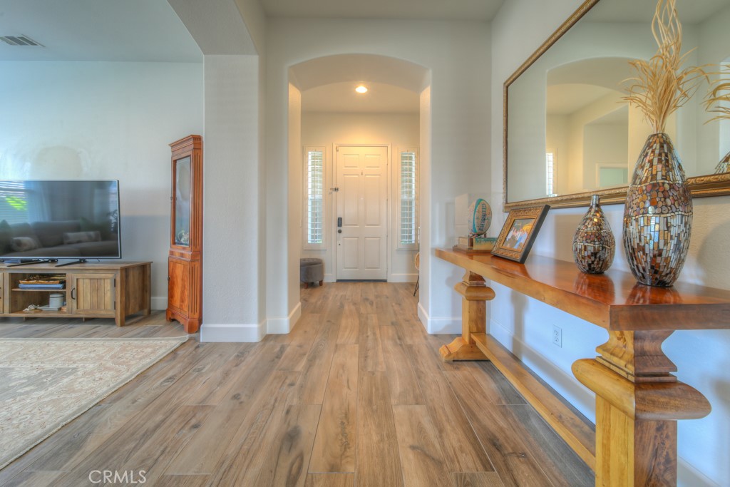 a view of a living room and dining room