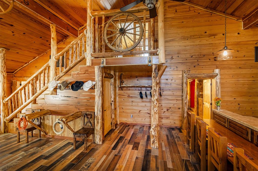 a view of a balcony with wooden floor