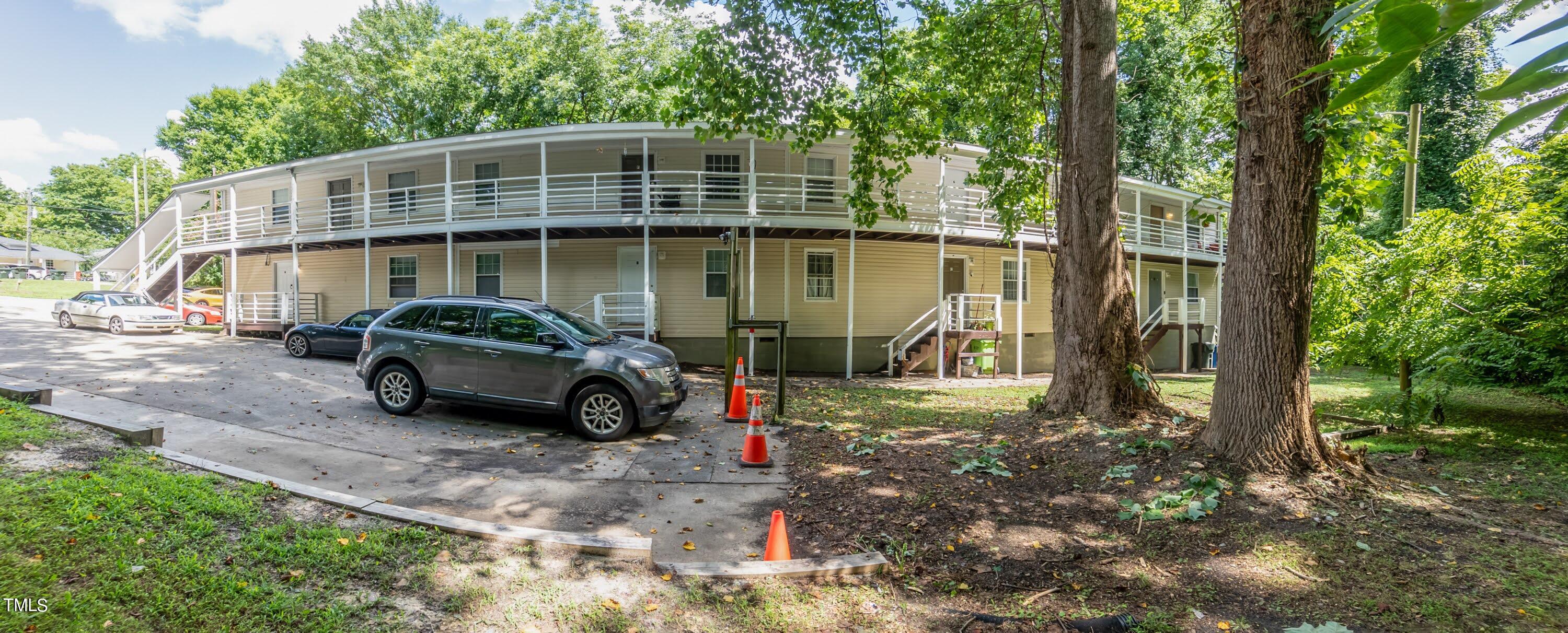 a car parked in front of a house