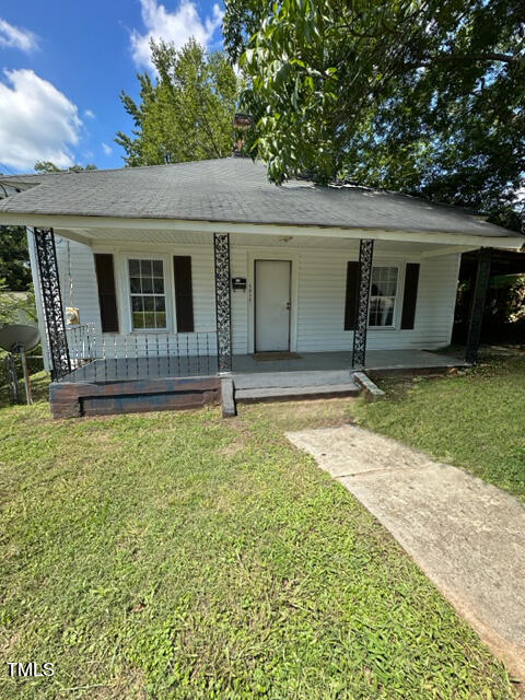 a front view of house with yard