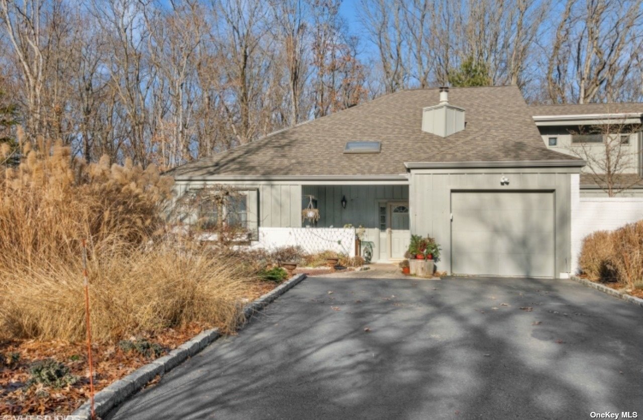 a front view of house with yard outdoor seating and barbeque oven