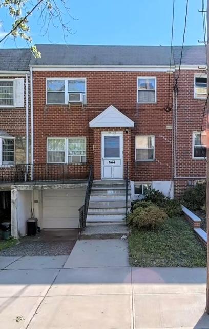 Multi unit property featuring a garage