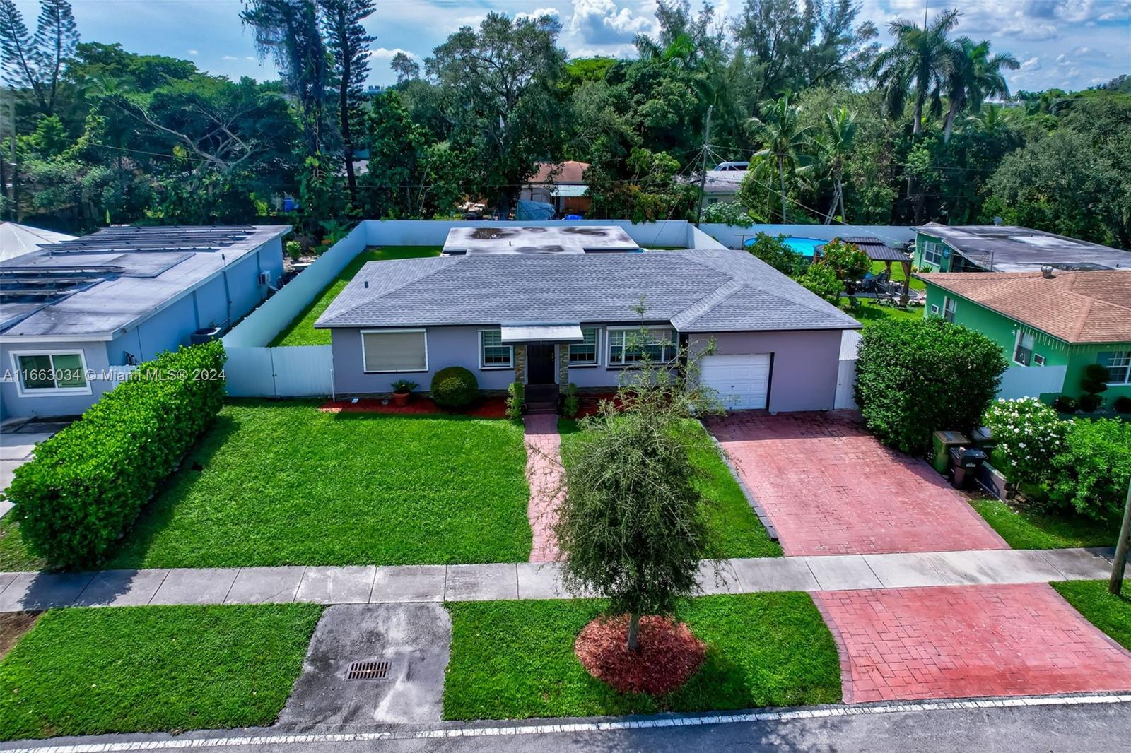 a aerial view of a house with garden