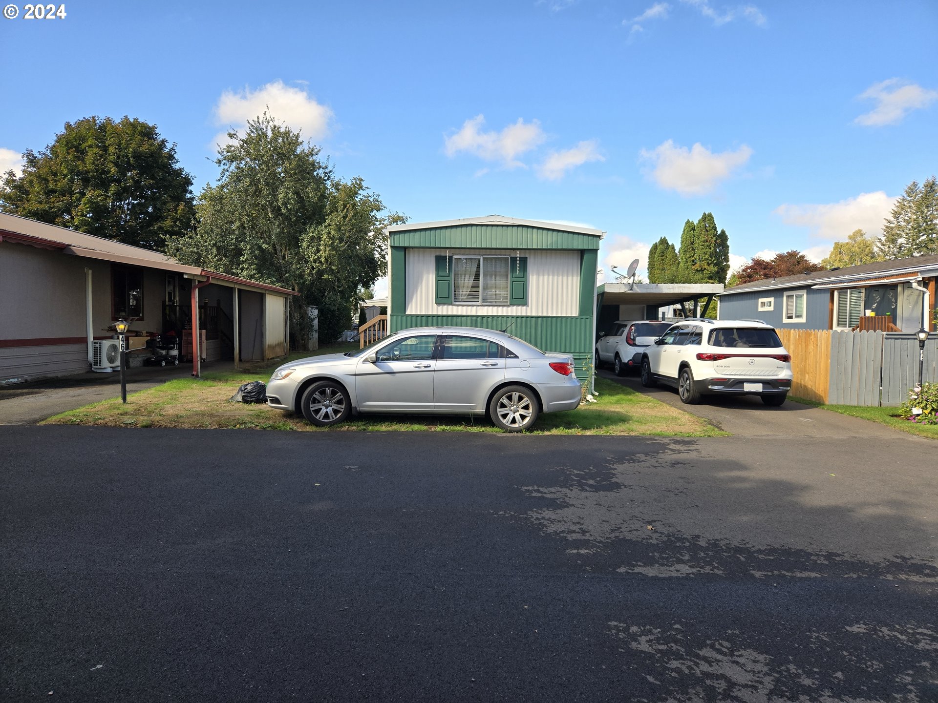 a car parked in front of a house