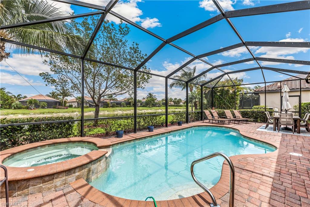 a view of a swimming pool with a patio