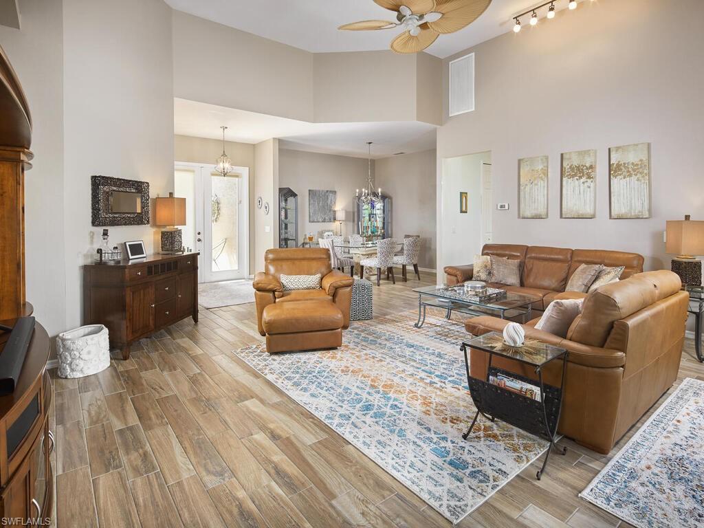 a living room with furniture and a rug