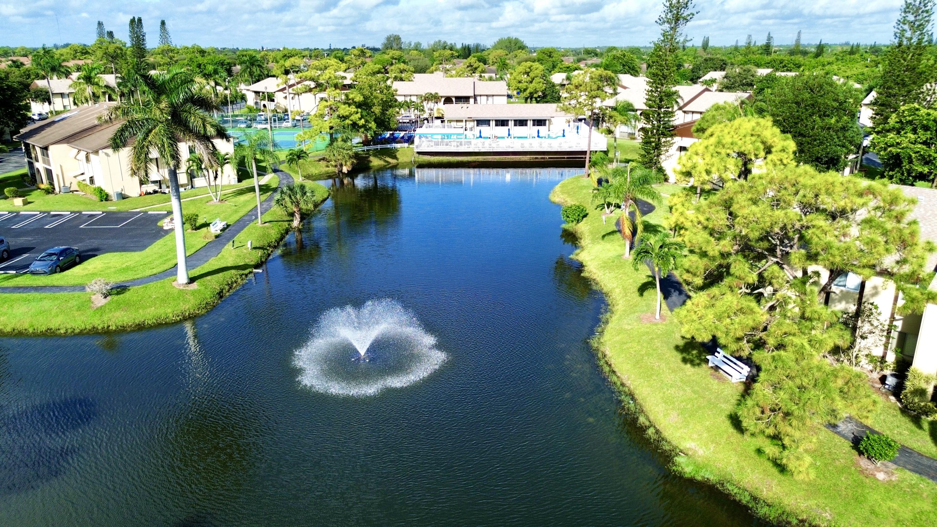 a view of a lake with a building in the background