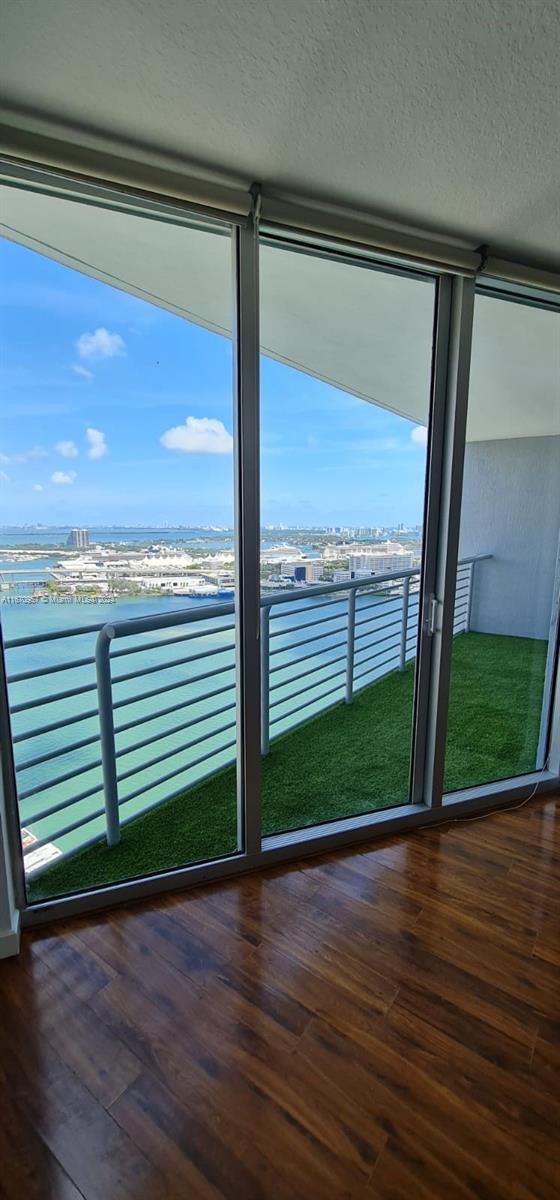 a view of outdoor space with wooden floor and window