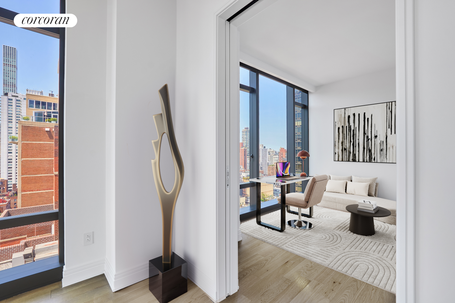 a view of a livingroom with furniture and a window