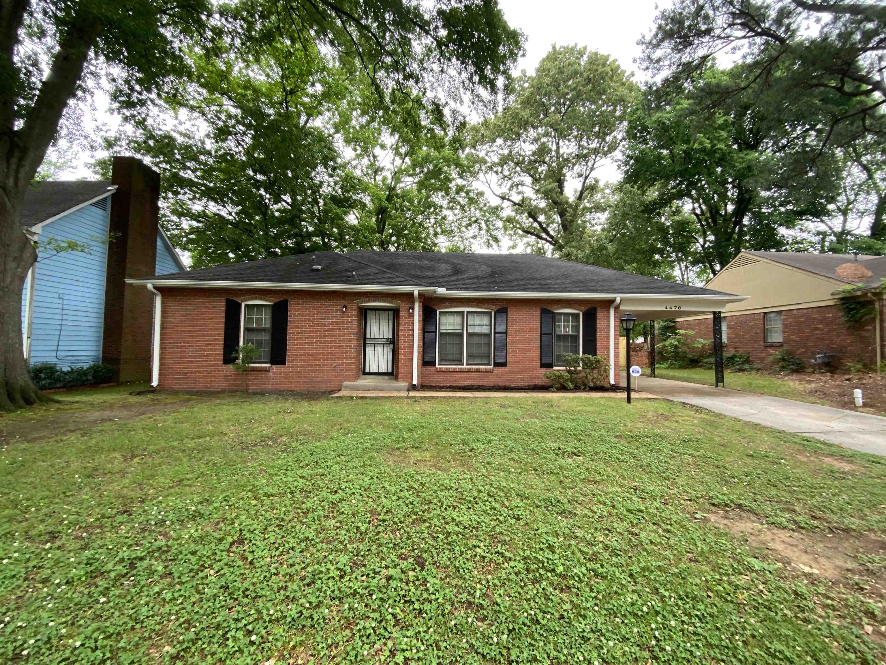 Ranch-style home with a front yard