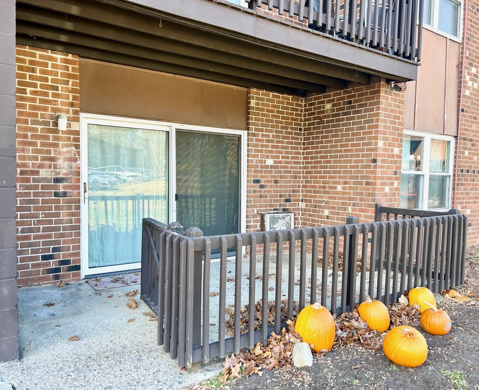 a view of a backyard with chairs