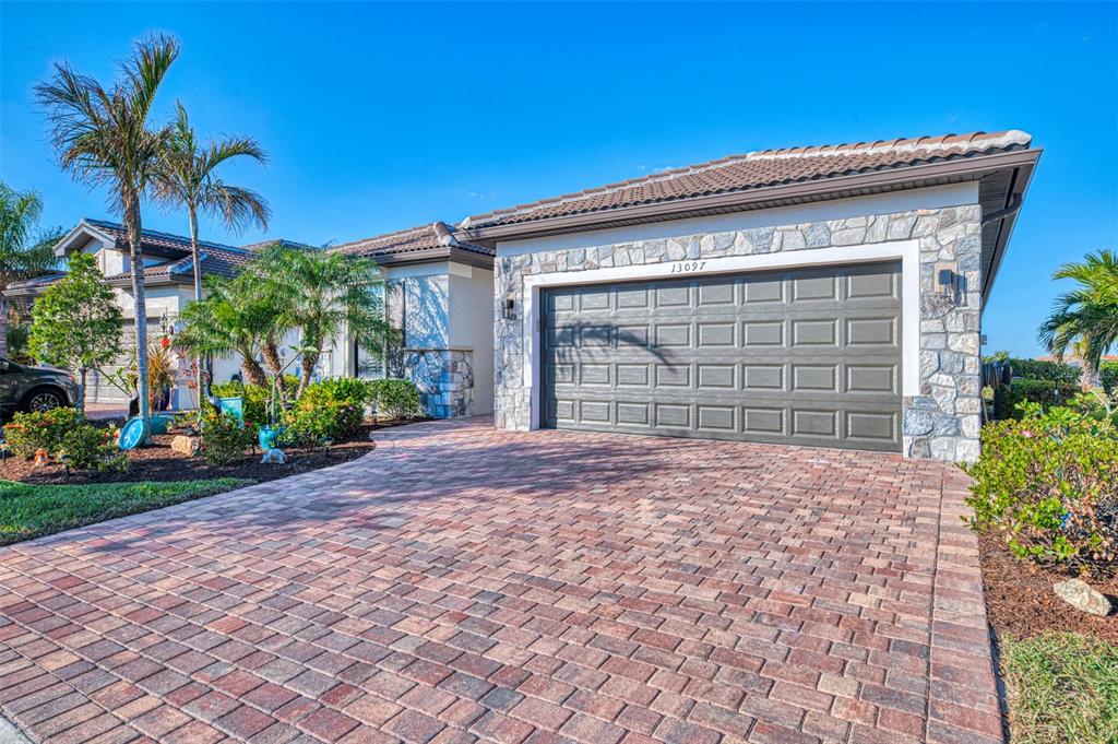 Welcome to the Summerwood at 13097 Rinella. Attractive stone veneer added to home.