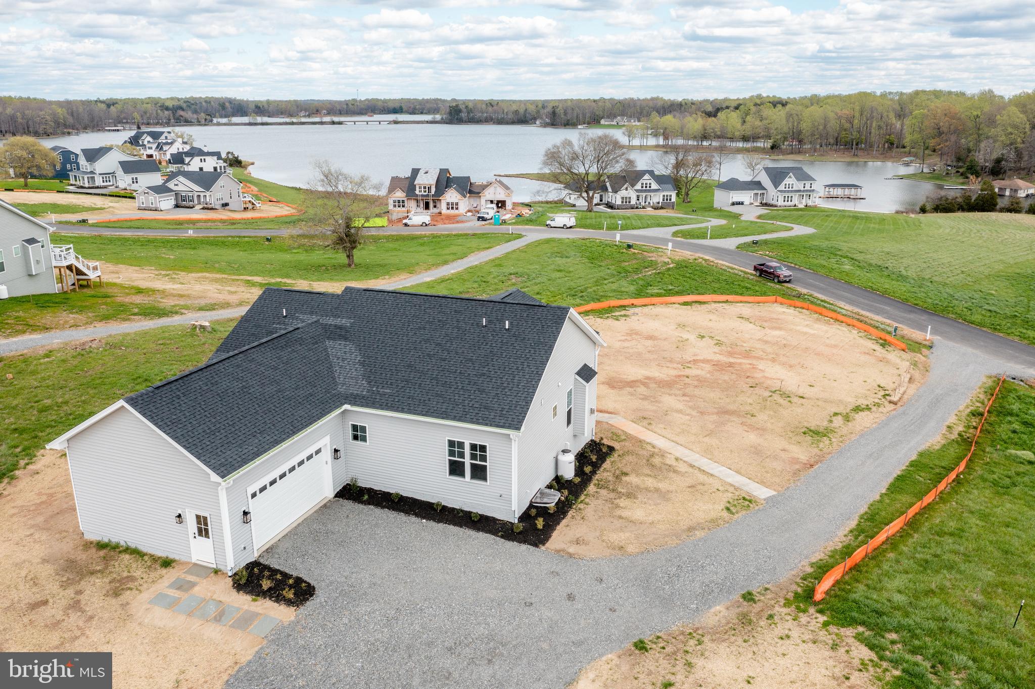 an aerial view of a house with outdoor space swimming pool