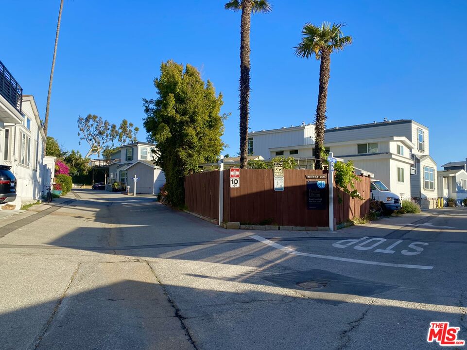 a view of a street with cars