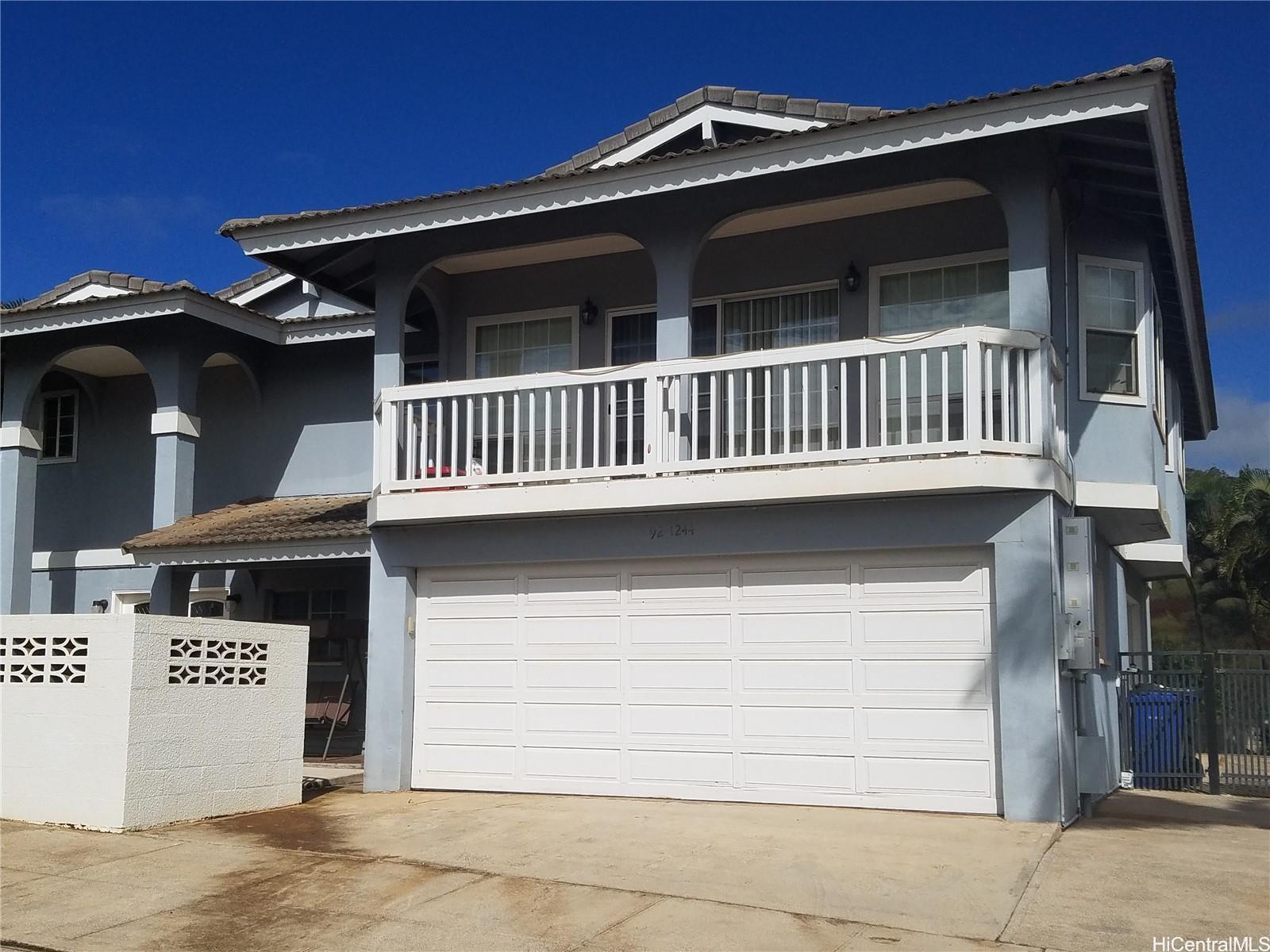 a view of a house with a garage