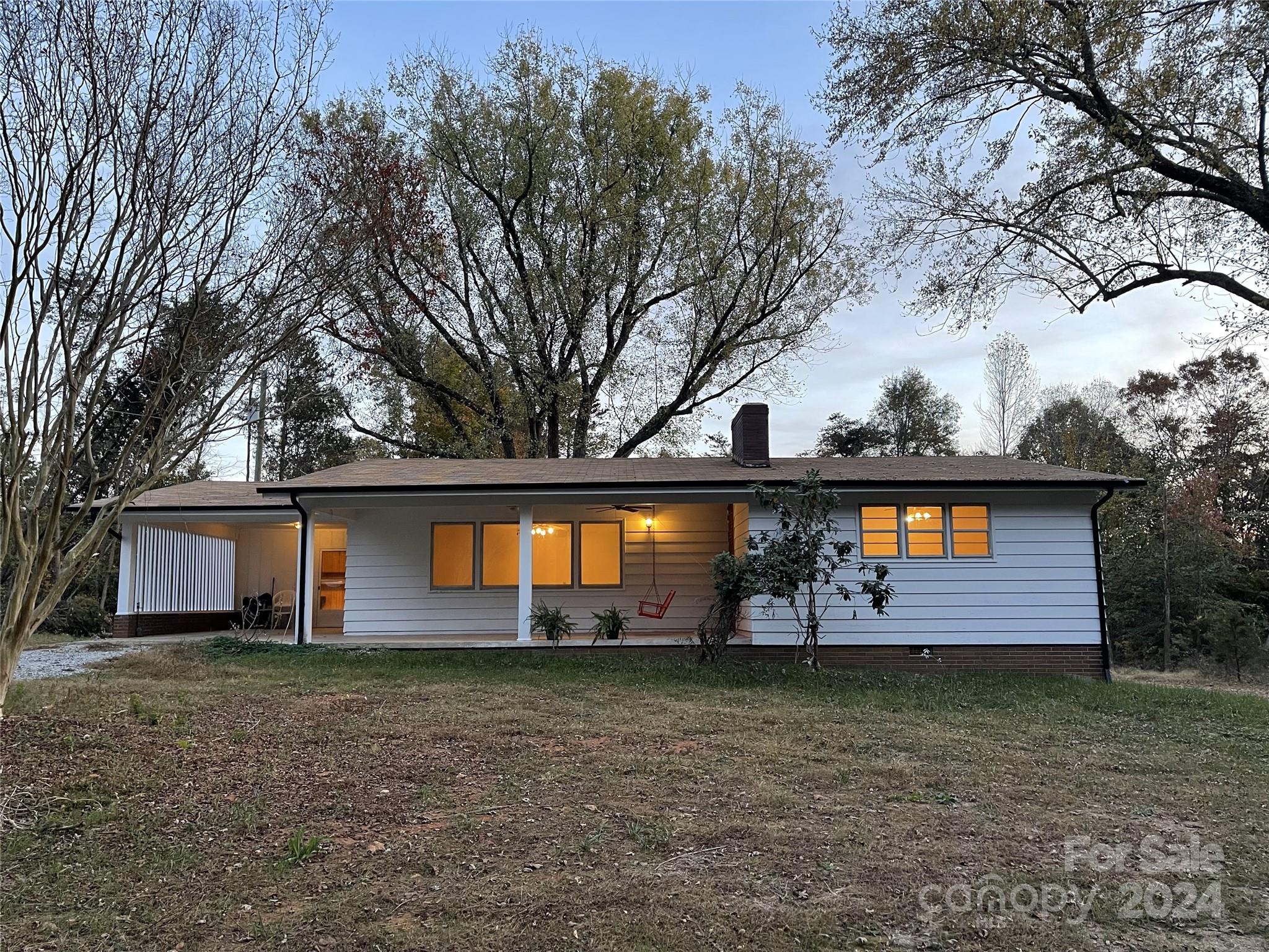 a front view of house with garden