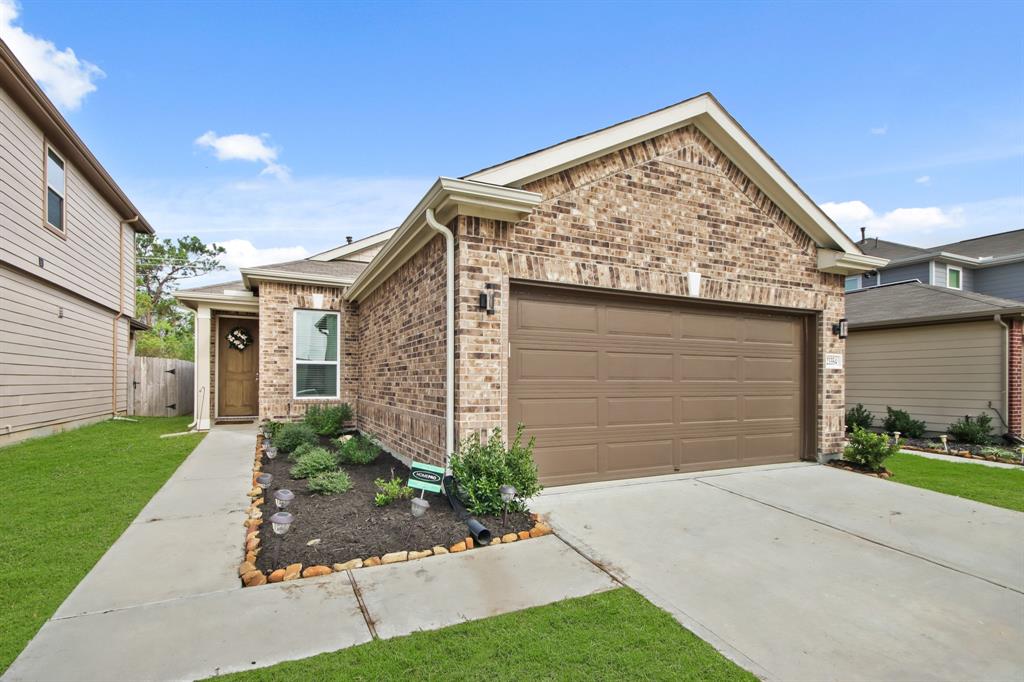 Welcome home to 23354 Stahl Creeks! This 1 story home greets you with a warm brick exterior, updated landscaping, charming curb appeal!