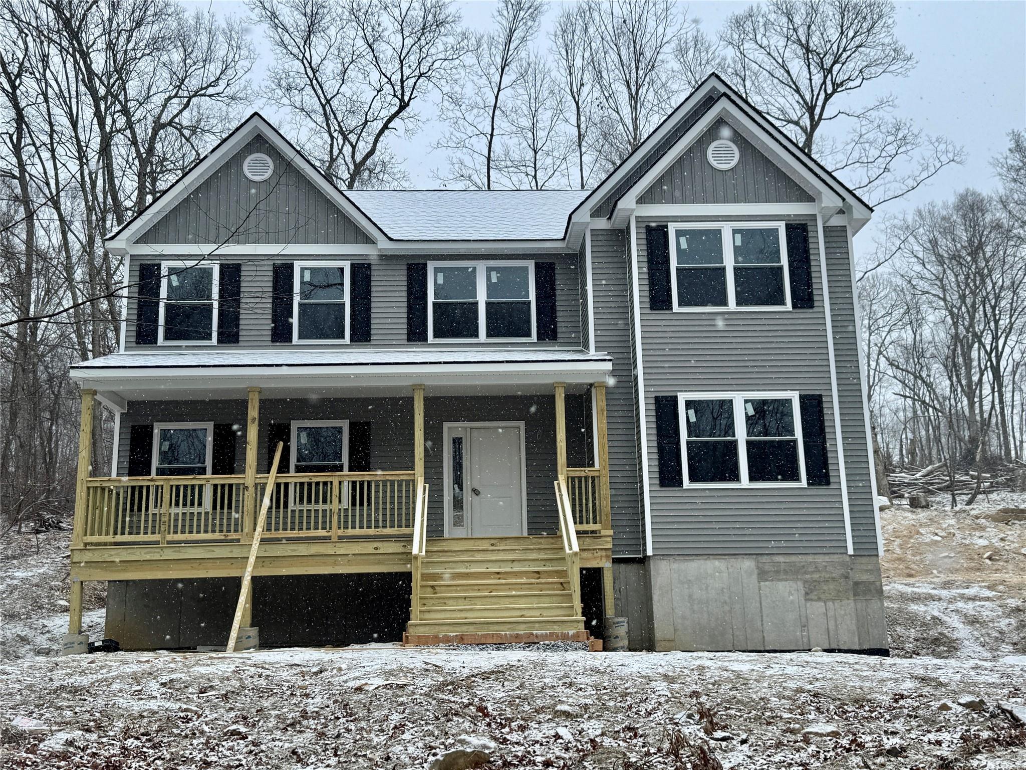 View of front of home with a porch