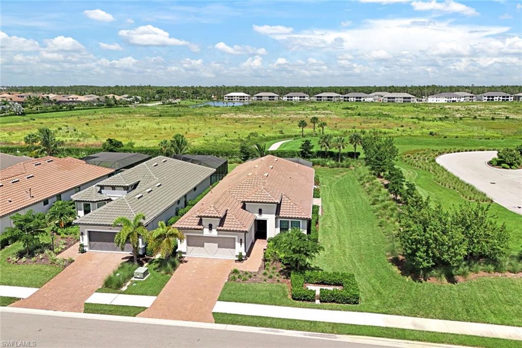 an aerial view of a house with a garden