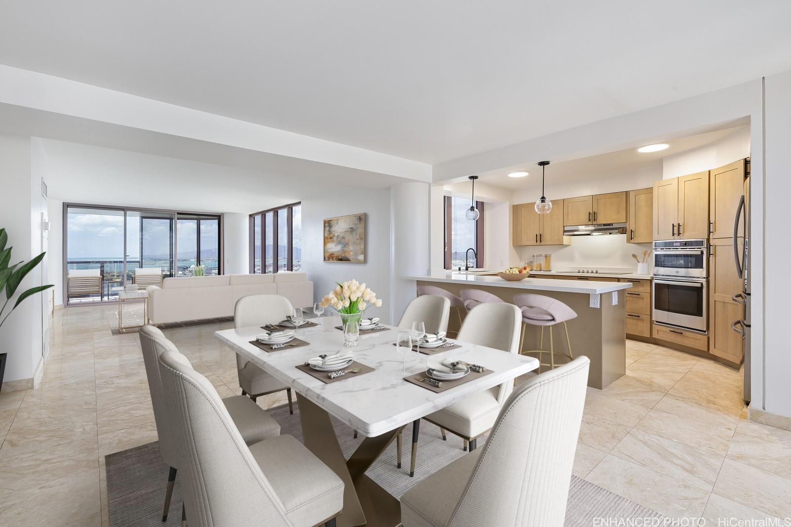 a view of a dining room and livingroom view kitchen with a table and chairs