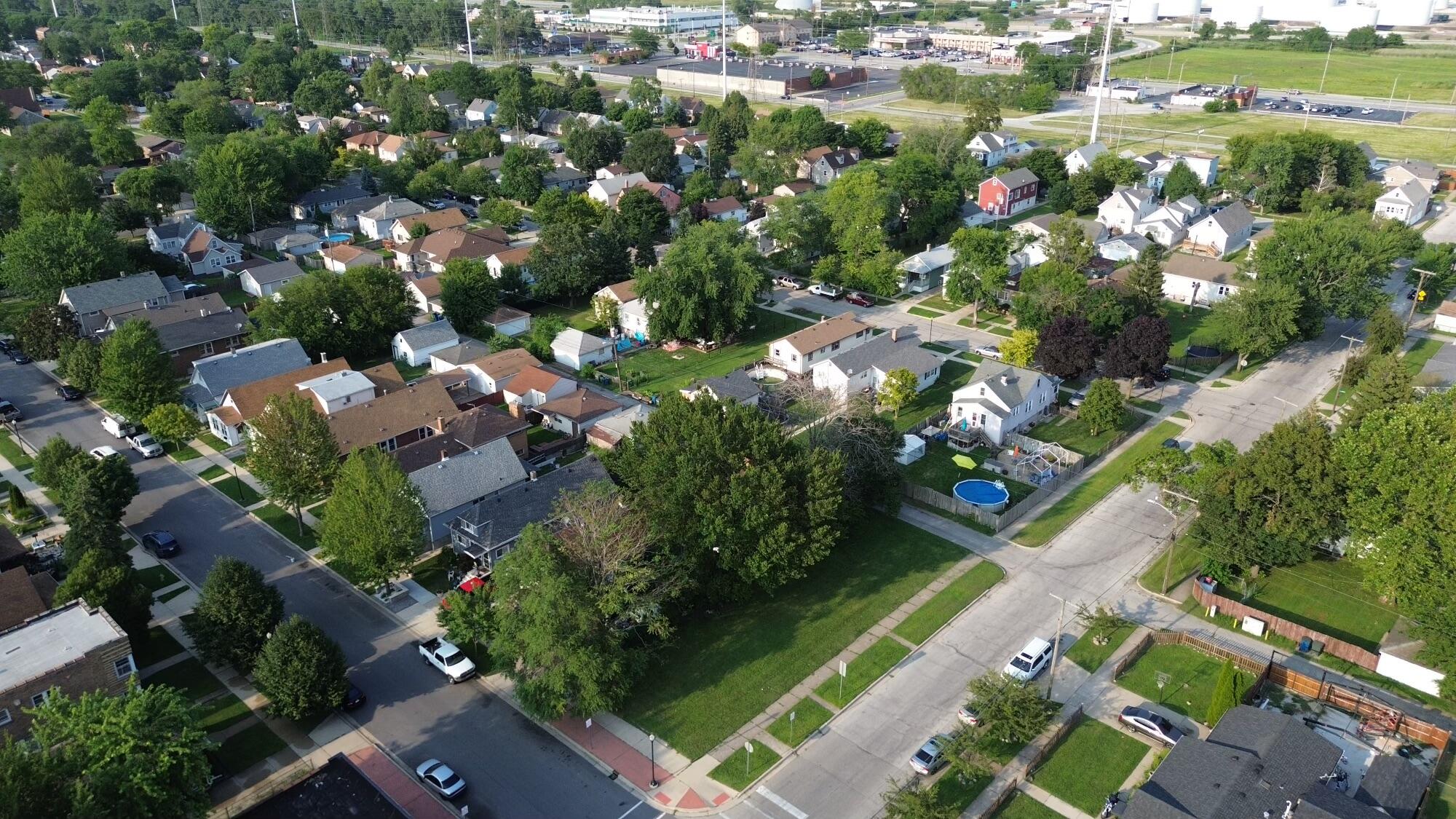 an aerial view of lake residential houses with outdoor space