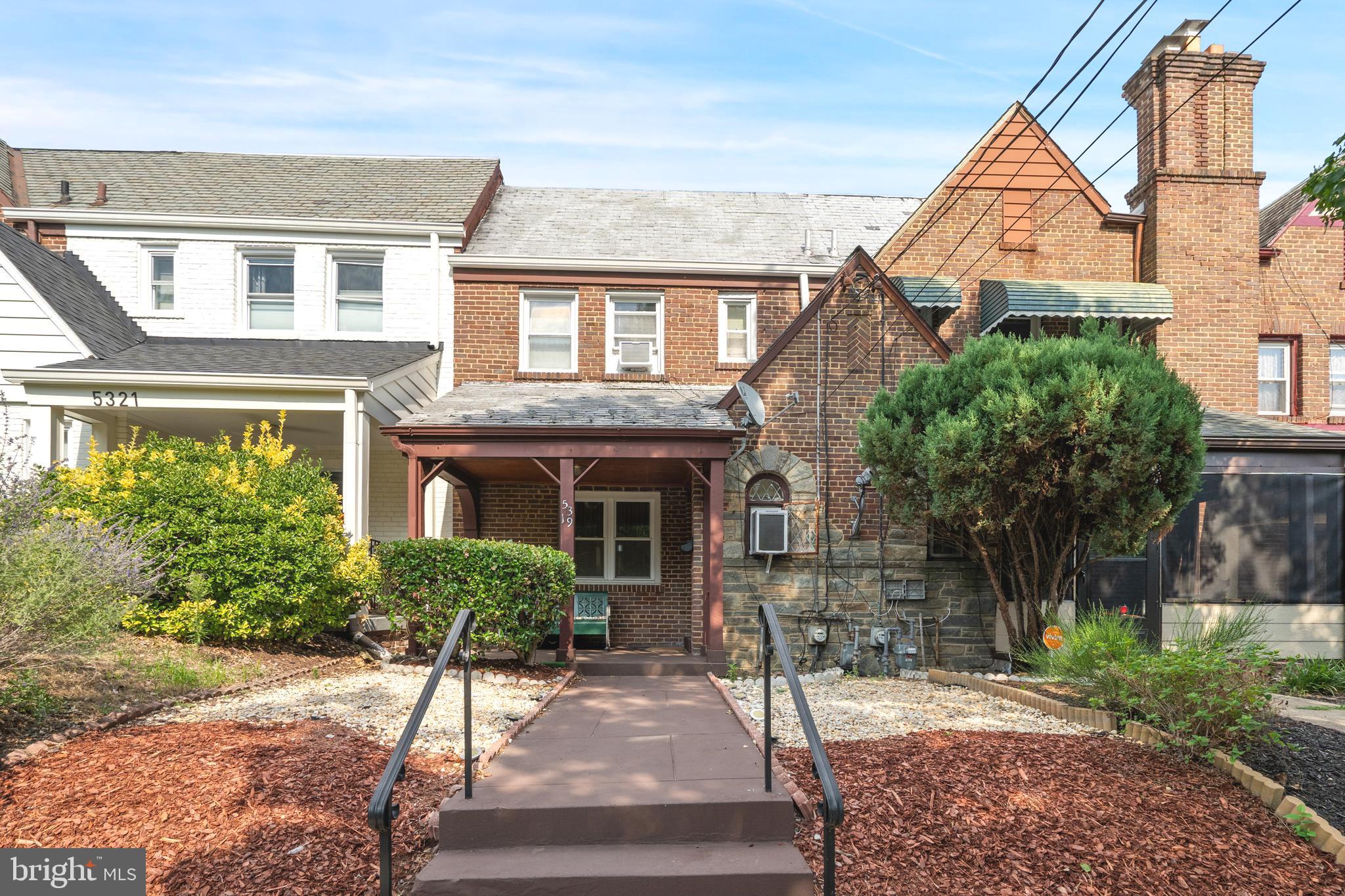 front view of house with a yard