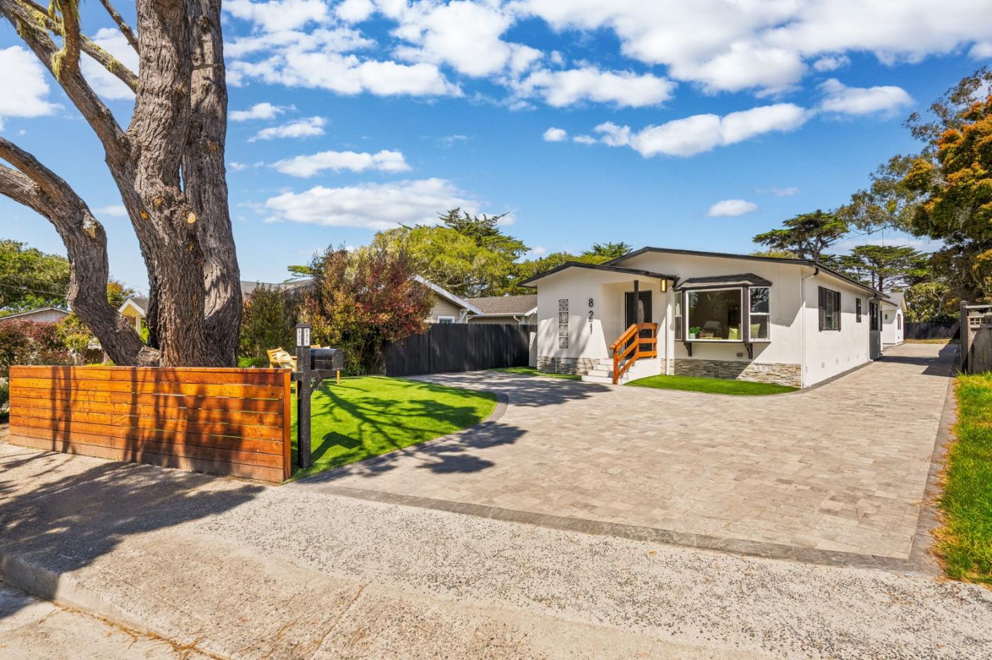 a front view of house with a yard