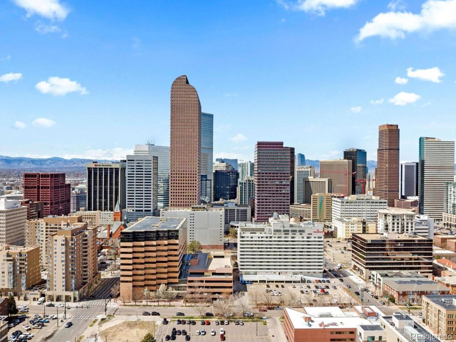 a view of city with tall buildings