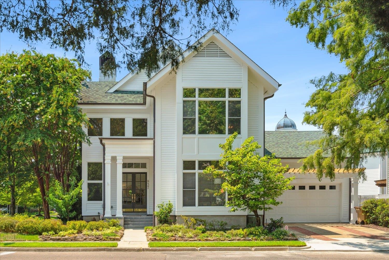 View of front of home featuring a garage