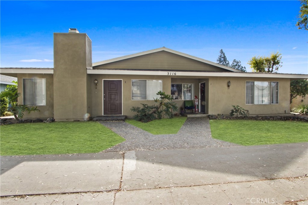 front view of house with a yard