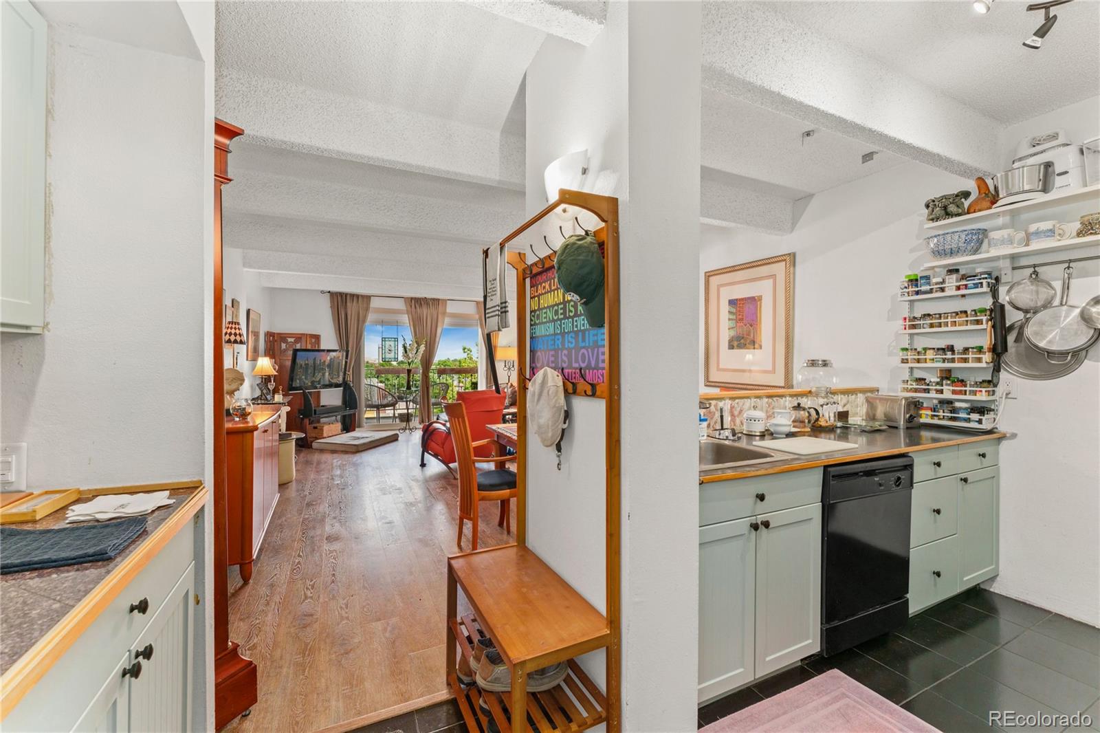 a view of a kitchen and dining room