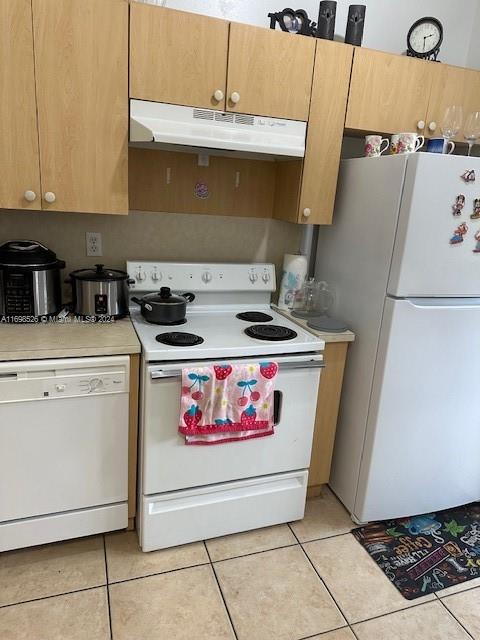 a utility room with washer and dryer