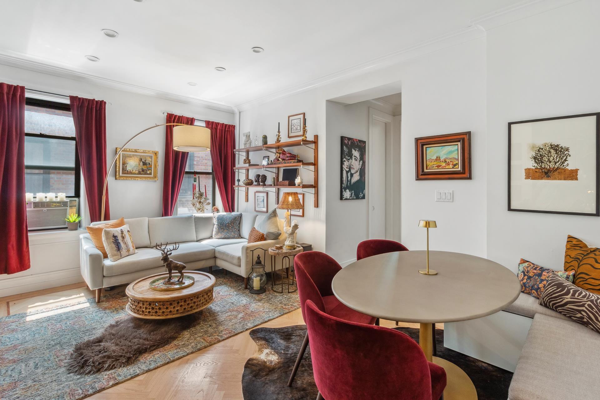 a living room with furniture and window