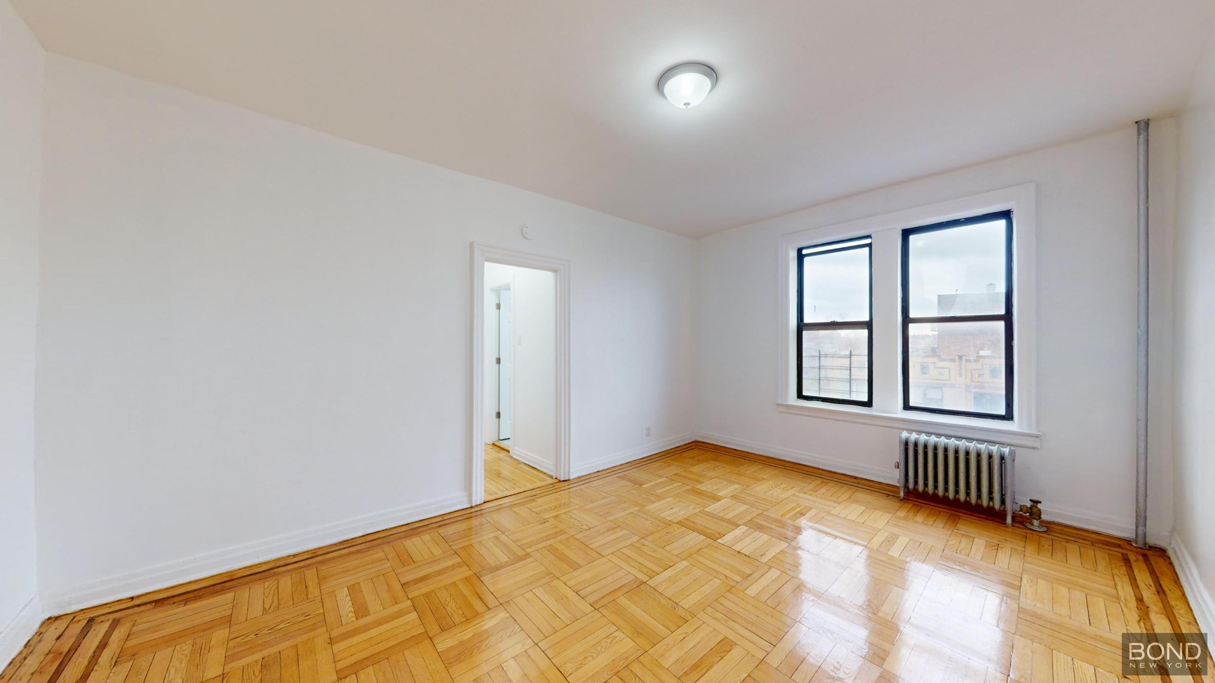 a view of a bedroom with window