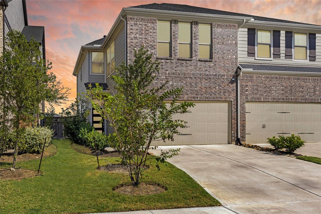 Welcome to 5215 Prairie Terrace Ln, a gorgeous, modern townhome in highly sought-after Cross Creek Ranch!