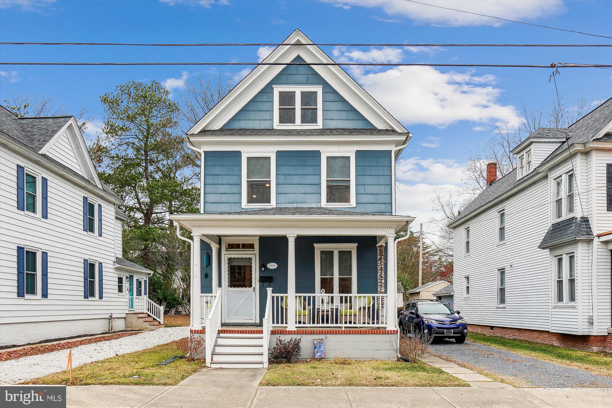 a front view of a house with a porch