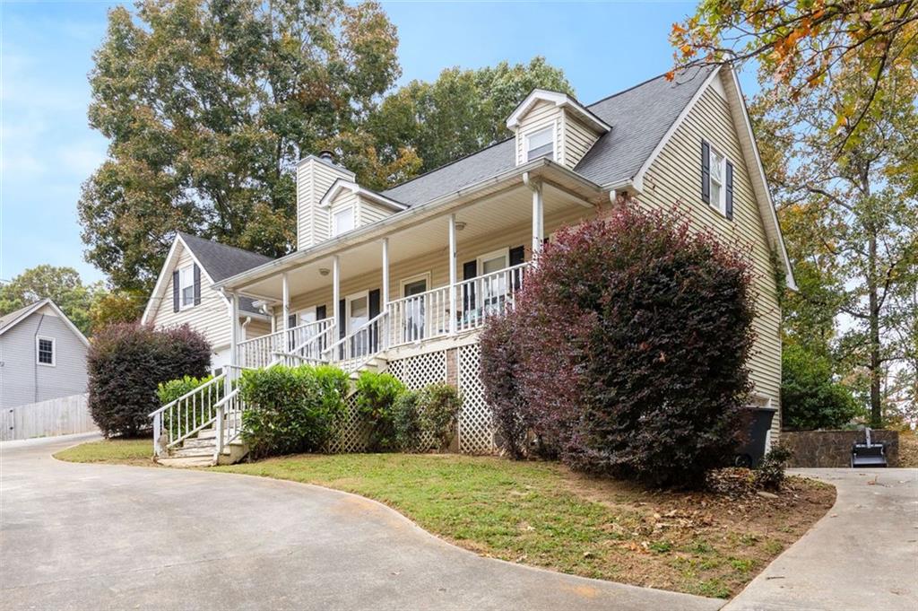 front view of a house with a yard