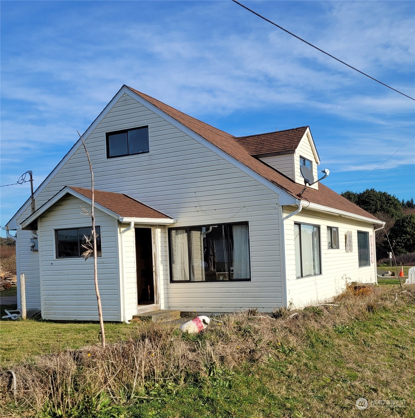 a house with trees in the background