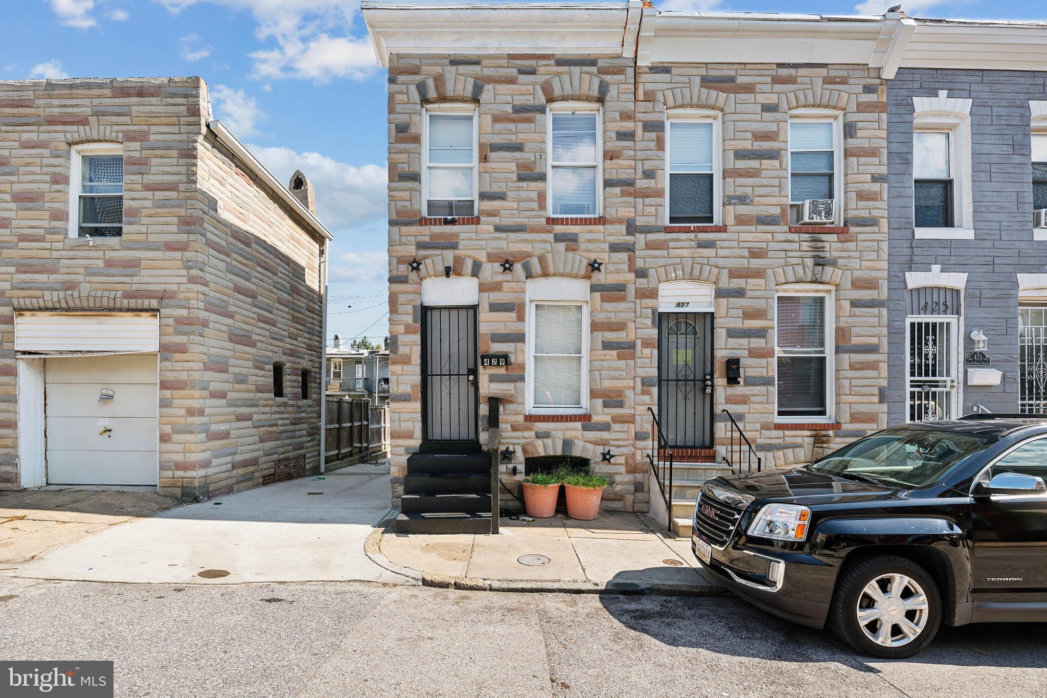 a car parked in front of a building