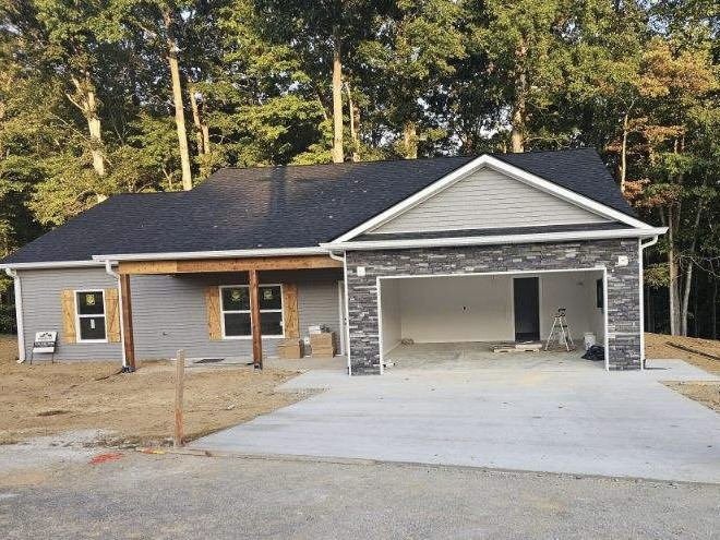 front view of a house with a yard